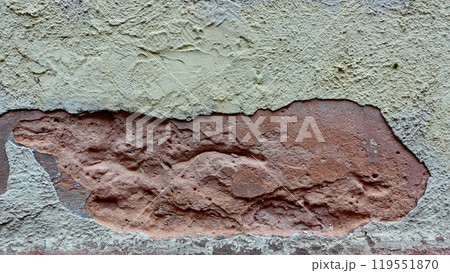 Texture of Weathered Wall With Peeling Paint in Urban Setting 119551870