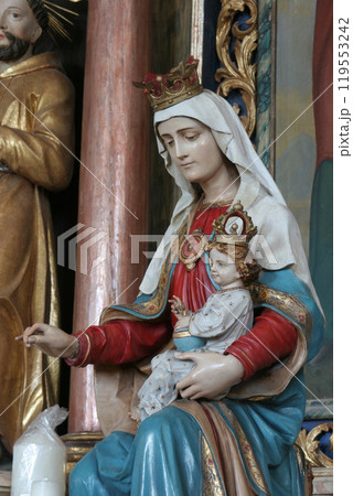 Virgin Mary with baby Jesus, statue on the altar of Saints Cyril and Methodius in Church of Birth of Virgin Mary in Svetice, Croatia Virgin Mary with baby Jesus, statue on the altar of Saints Cyril and Methodius in Church of Birth of Virgin Mary in Svetice, Croatia 119553242