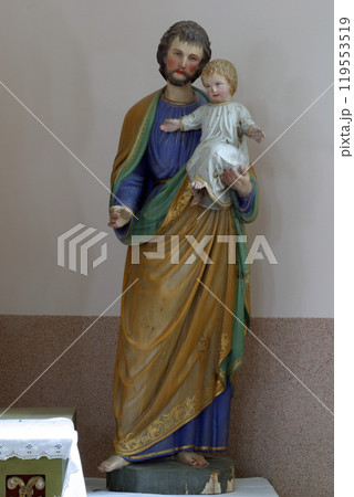 Saint Joseph holding baby Jesus 119553519