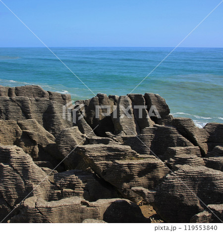 Unique Pancake Rocks and turquoise sea in Punakaiki, New Zealand. 119553840