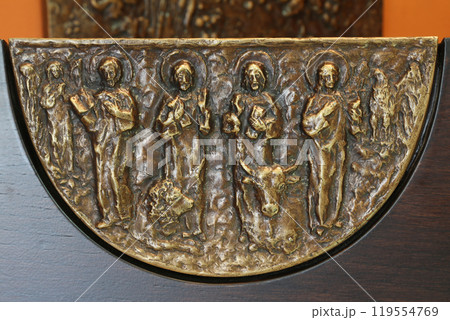 The evangelists, bass relief on ambon in Chapel of Saint Dismas in Zagreb, Croatia The evangelists, bass relief on ambon in Chapel of Saint Dismas in Zagreb, Croatia 119554769