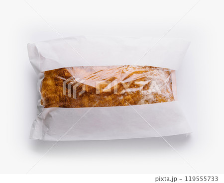 Sealed bread loaf in transparent packaging 119555733