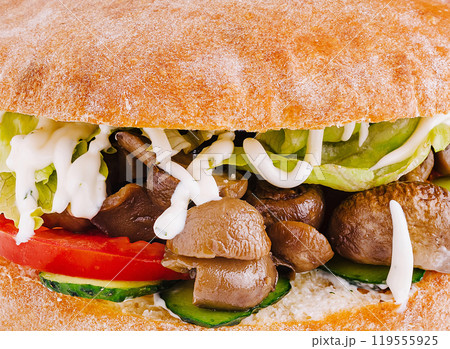 Delicious vegetarian sandwich with mushrooms, tomatoes and cucumbers Delicious vegetarian sandwich with mushrooms, tomatoes and cucumbers 119555925