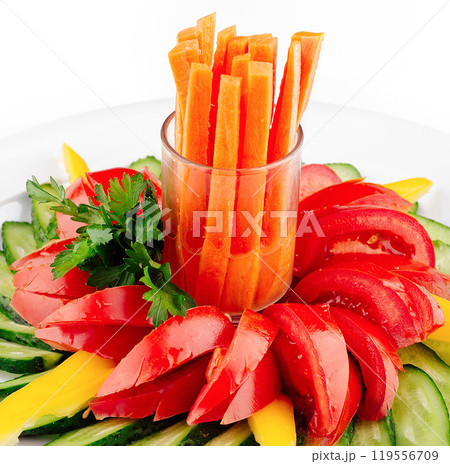 Freshly cut vegetables forming a colorful and healthy salad Freshly cut vegetables forming a colorful and healthy salad 119556709