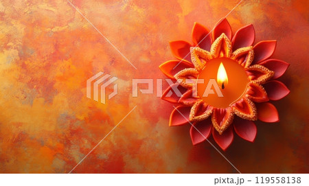 Diwali Festive Candle, Lotus Flower Shaped Candle on Orange Background 119558138