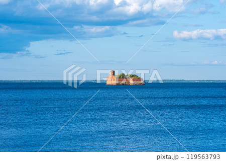 ancient sea fort in the Baltic Sea at sunset 119563793