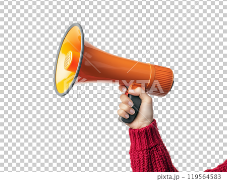 A close-up view captures a female hand, adorned in a red sweater, grasping an orange loudspeaker or microphone, ready to amplify her voice. A close-up view captures a female hand, adorned in a red sweater, grasping an orange loudspeaker or microphone, ready to amplify her voice. 119564583