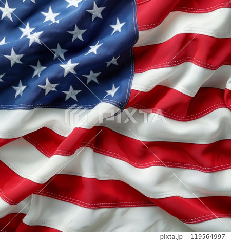 The map highlights the United States, displaying a striking representation of the American flag. Each states outline is filled with red and blue stripes and white stars, symbolizing national pride. 119564997