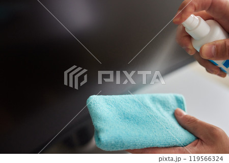 computer cleaning cloth to disinfect the office office cleaning staff cleaning maid computer cleaning cloth to disinfect the office office cleaning staff cleaning maid 119566324