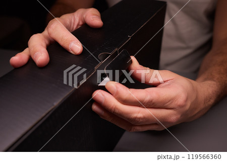 Unboxing a Remarkably Stylish and Innovative Tech Device That Features an Eye Catching Design 119566360