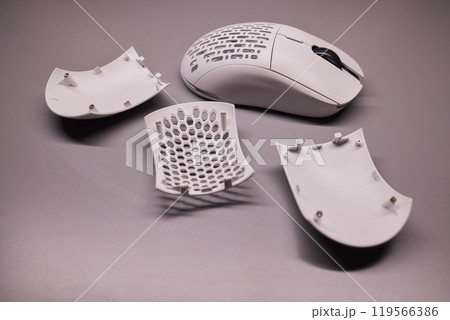 white new wireless computer mouse flat lay with led lights 119566386
