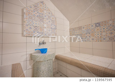 Azure and white textile floor with bench in brick building Azure and white textile floor with bench in brick building 119567595