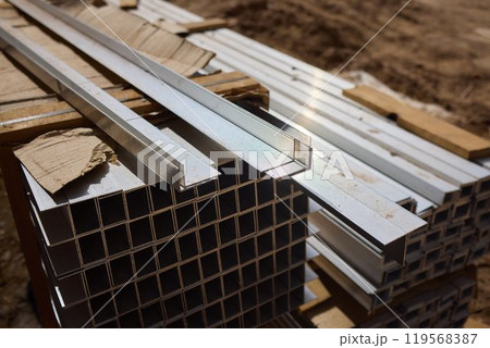 A metal structure is being constructed on site with engineering precision 119568387