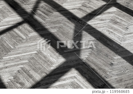 Abstract background with shadows on wooden parquet. Black and white. Abstract background with shadows on wooden parquet. Black and white. 119568685