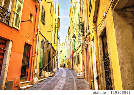 Colorful streets of the historic center of the city of Menton on the French Riviera, Cote d'Azur, France Colorful streets of the historic center of the city of Menton on the French Riviera, Cote d'Azur, France 119568911
