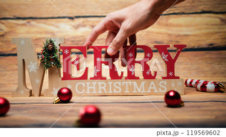Merry Christmas SIgn on Wodden backgroud 119569602