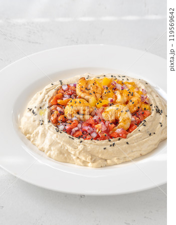 Portion of hummus Portion of hummus 119569642