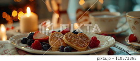 Romantic Valentine's Day Breakfast with Heart Pancakes and Fresh Berries for Cozy Mornings 119572865