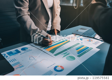 Team of business people are meeting to analyze data for marketing plan,Market research reports and income statistics, Financial and Accounting concept. Team of business people are meeting to analyze data for marketing plan,Market research reports and income statistics, Financial and Accounting concept. 119575581