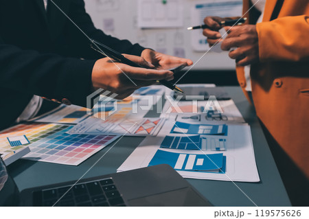 The designer team is designing the uxui system to make the uxui system work well on new phones and support system updates. Website development concept UI UX front end designer 119575626