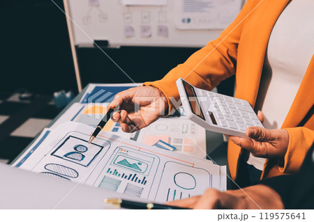 The designer team is designing the uxui system to make the uxui system work well on new phones and support system updates. Website development concept UI UX front end designer 119575641