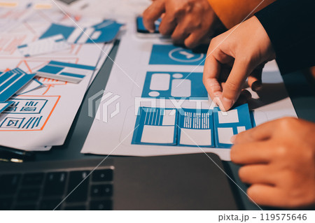 The designer team is designing the uxui system to make the uxui system work well on new phones and support system updates. Website development concept UI UX front end designer 119575646