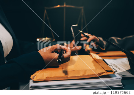 Judge gavel with Justice lawyers having team meeting at law firm background. Concepts of Law and Legal services. Judge gavel with Justice lawyers having team meeting at law firm background. Concepts of Law and Legal services. 119575662