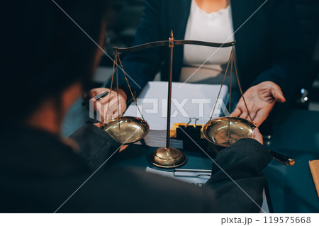 Judge gavel with Justice lawyers having team meeting at law firm background. Concepts of Law and Legal services. Judge gavel with Justice lawyers having team meeting at law firm background. Concepts of Law and Legal services. 119575668