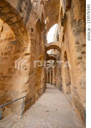 Impressive ruins of the largest colosseum in North Africa, huge Roman amphitheater in small village of El Jem, Tunisia 119576340