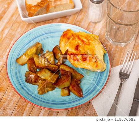 Grilled chicken breast with artichokes, healthy dinner Grilled chicken breast with artichokes, healthy dinner 119576688
