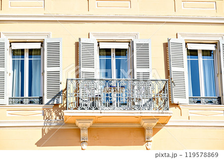Typical and colorful facade of the houses of Saint-Tropez, French Riviera, Cote d'Azur, France 119578869