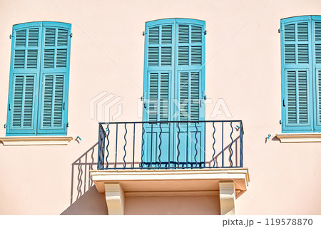 Typical and colorful facade of the houses of Saint-Tropez, French Riviera, Cote d'Azur, France 119578870