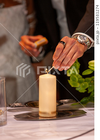 An exquisite Ceremony Candle Lighting event featuring a beautifully elegant table setting 119581274