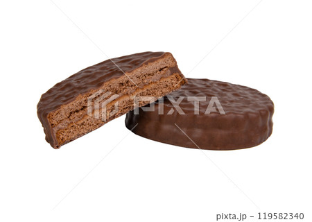 Brown chocolate sandwich cookies isolated on the white background Brown chocolate sandwich cookies isolated on the white background 119582340