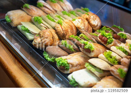 Burgers, sandwich and hotdogs on showcase Burgers, sandwich and hotdogs on showcase 119582509