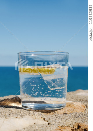 sparkling water or tonic water in a glass sparkling water or tonic water in a glass 119583933