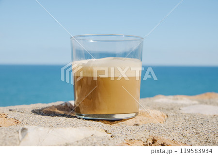 glass with caffe latte or latte macchiato glass with caffe latte or latte macchiato 119583934