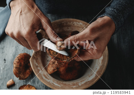 cuts the stem of some typical catalan rovellons cuts the stem of some typical catalan rovellons 119583941