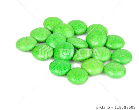 Green dragee drops chocolate glazed isolated on the white background 119585609