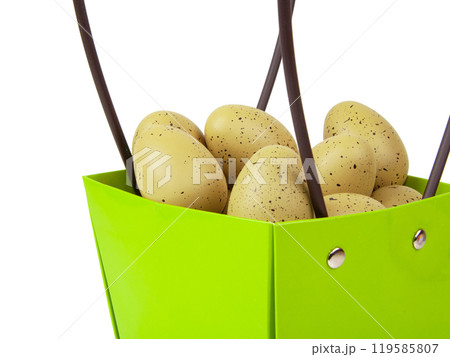 Bird eggs decorated in green basket isolated on the white background 119585807