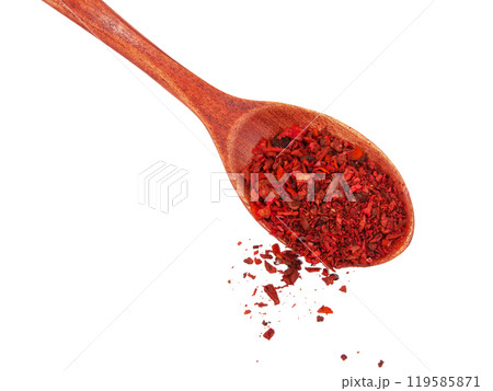 Dried tomato and paprika spice in wooden spoon isolated on the white background 119585871