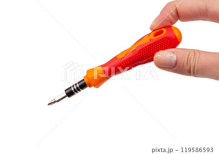 Red screwdriver in hand isolated on the white Red screwdriver in hand isolated on the white 119586593