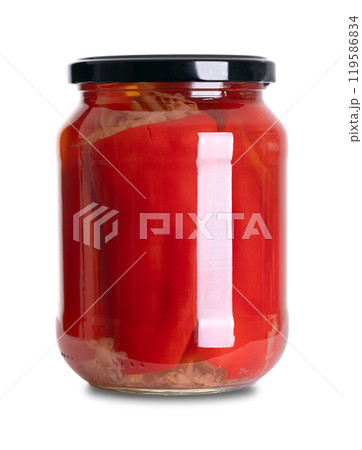 Red bell peppers stuffed with German sauerkraut, pickled in a glass jar with screw cap. Sweet peppers filled with fermented cabbage, preserved in a brine of vinegar and salt. A barbecue side dish. 119586834