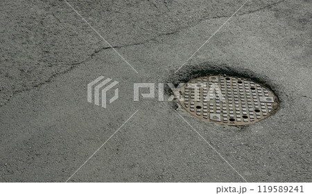 Manhole for collecting rainwater on the road. 119589241