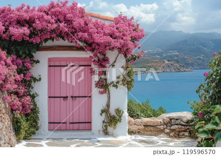 Charming pink door framed by vibrant bougainvillea near the stunning coast in Santorini, Greece Charming pink door framed by vibrant bougainvillea near the stunning coast in Santorini, Greece 119596570