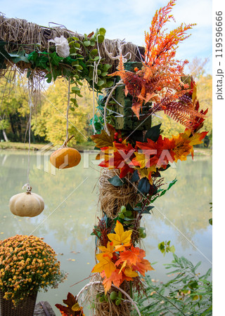 Autumn Halloween pumpkin decorations in a park background 119596666
