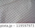 Recycled perforated white paper close up texture 119597973