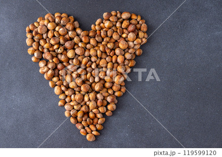 Heart Nuts. Hazelnut food background. 119599120