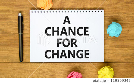 A chance for change symbol. Concept words A chance for change on beautiful white note. Beautiful wooden table background. Colored paper. Black pen. Business A chance for change concept. Copy space. A chance for change symbol. Concept words A chance for change on beautiful white note. Beautiful wooden table background. Colored paper. Black pen. Business A chance for change concept. Copy space. 119599345