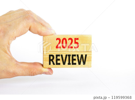 Planning 2025 review new year symbol. Concept words 2025 Review on beautiful wooden blocks. Beautiful white background. Businessman hand. Business 2025 review new year concept. Copy space. Planning 2025 review new year symbol. Concept words 2025 Review on beautiful wooden blocks. Beautiful white background. Businessman hand. Business 2025 review new year concept. Copy space. 119599368
